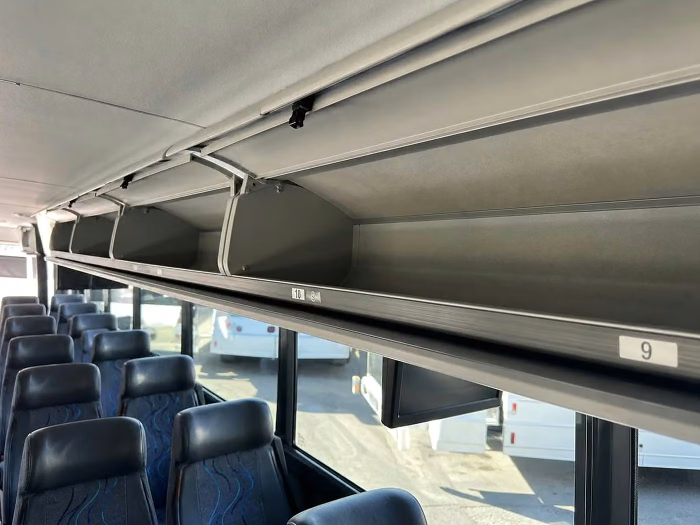 san dimas 25 passenger minibus overhead storage