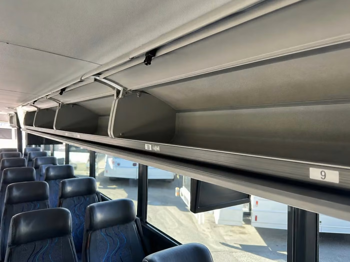 san dimas 28 passenger minibus overhead storage