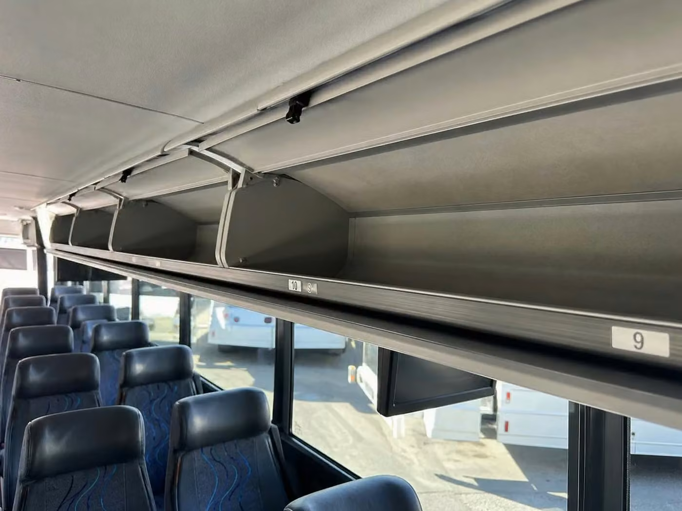 san dimas 35 passenger minibus overhead storage